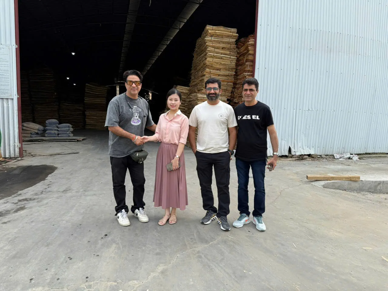 international buyers reviewing plywood specifications at vietnam factory hcply