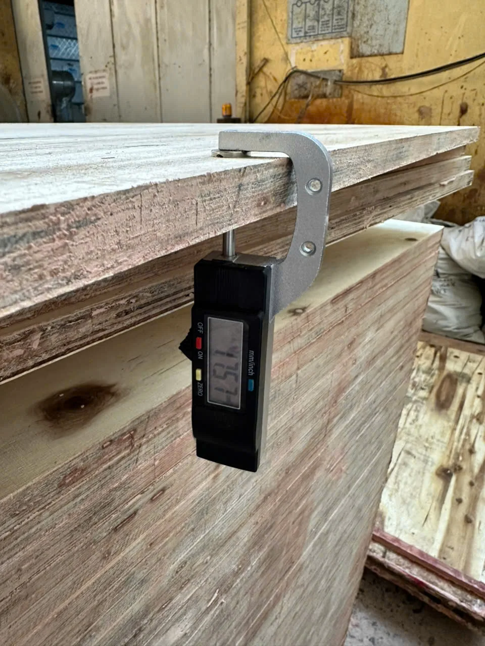 Mika Plywood plywood quality control inspection — sanding line calibration maintains thickness tolerance before container loading