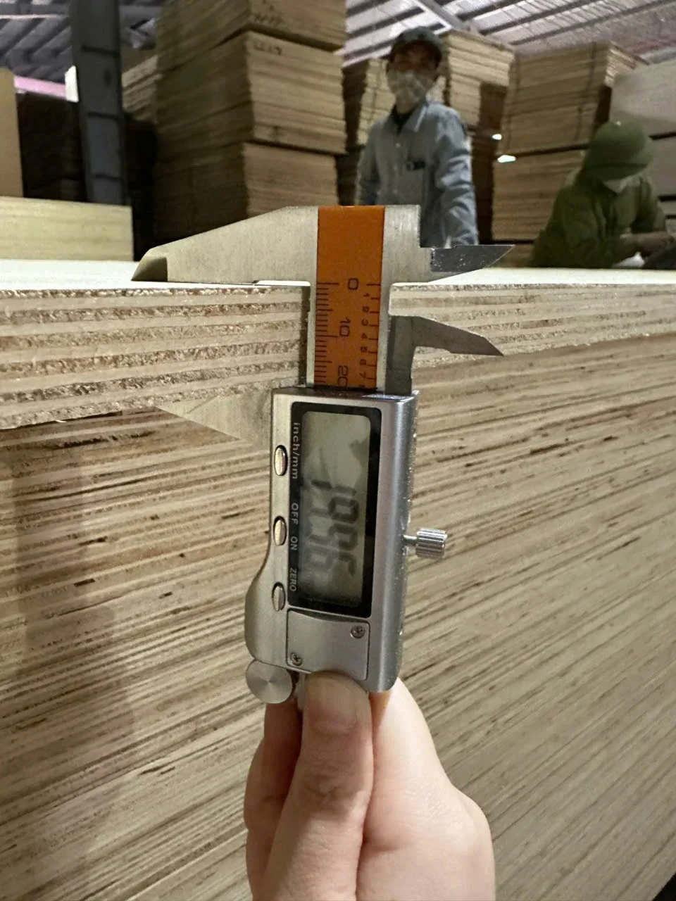 Digital caliper thickness measurement — furniture grade plywood QC Mika Plywood Vietnam