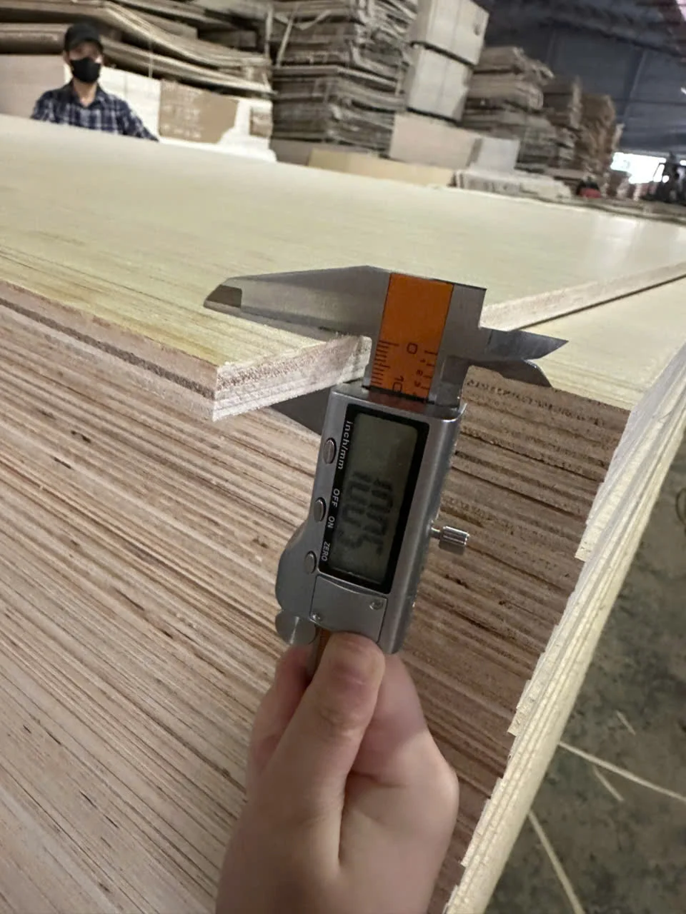 Vietnam calibrated plywood panels QC inspection 18mm thickness uniform surface Mika Plywood factory