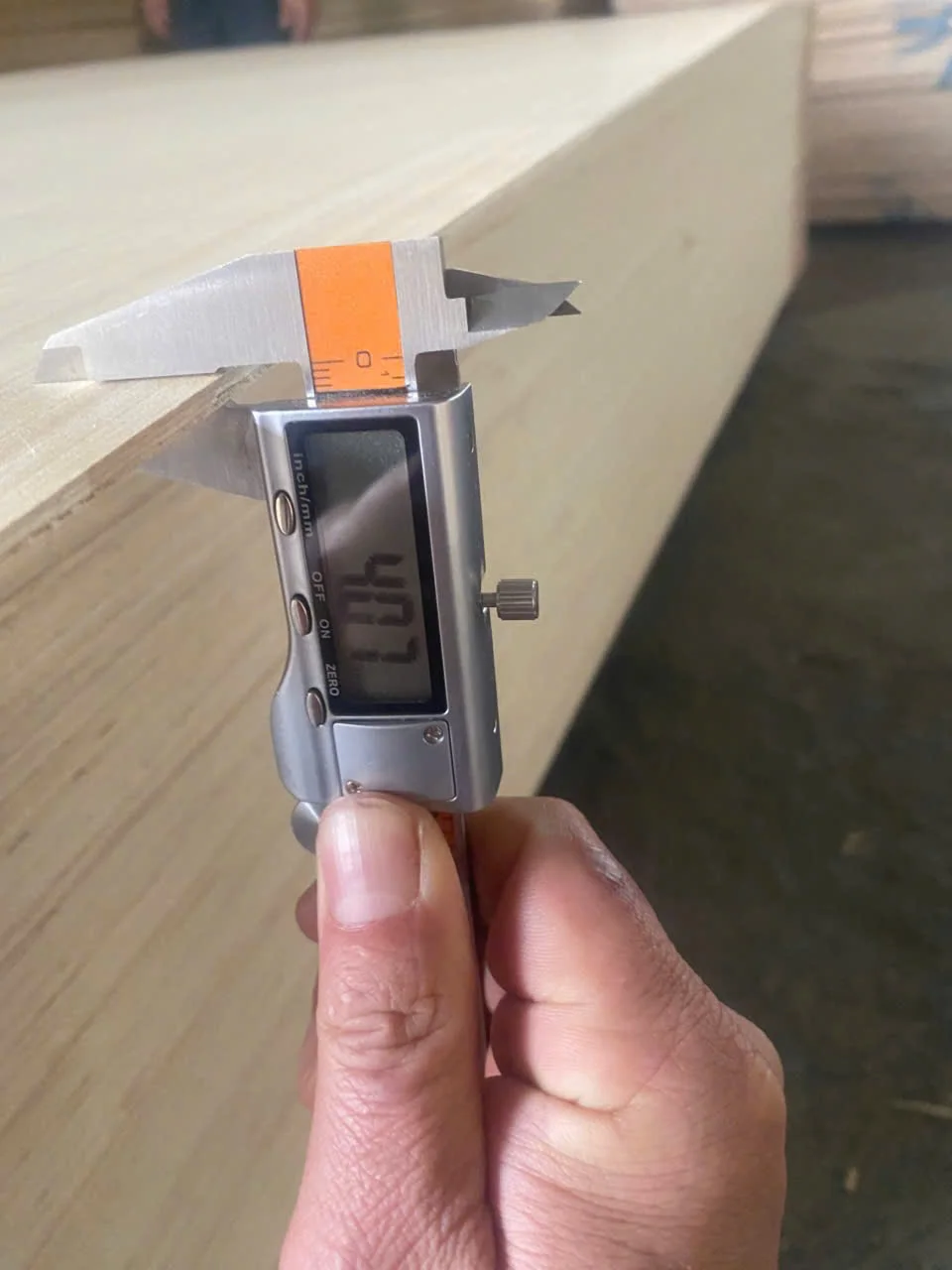 Vietnam plywood thickness measurement with digital caliper — Mika Plywood quality control